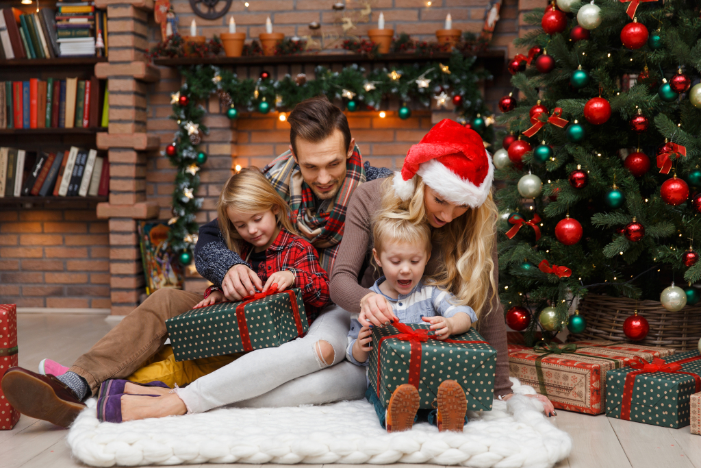 Parents and Children Opening Presents